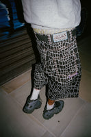 croc print denim shorts